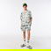 Lacoste x Netflix Unisex Relaxed Fit Kısa Kollu Desenli Bej Gömlek