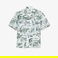 Lacoste x Netflix Unisex Relaxed Fit Kısa Kollu Desenli Bej Gömlek