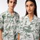 Lacoste x Netflix Unisex Relaxed Fit Kısa Kollu Desenli Bej Gömlek