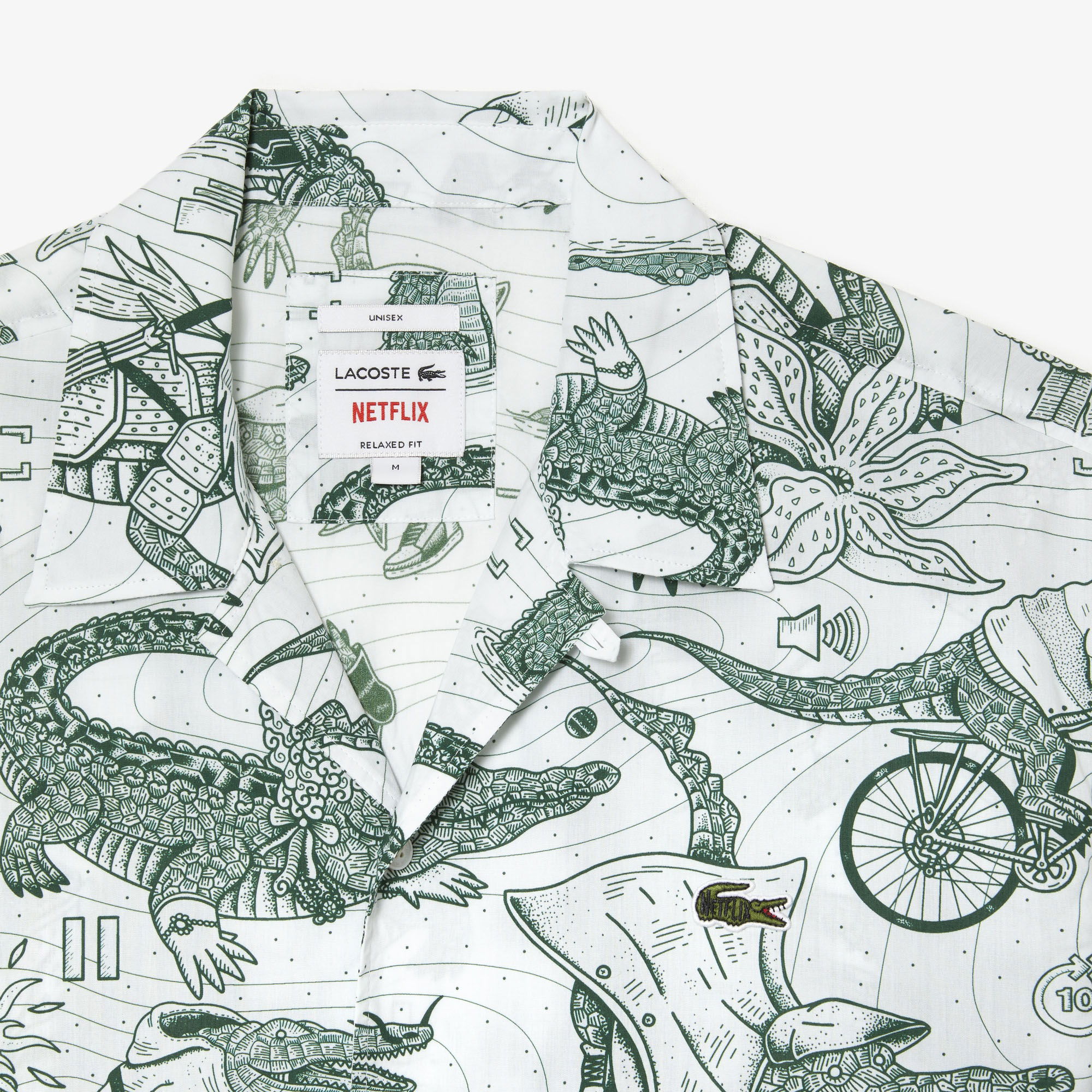 Lacoste x Netflix Unisex Relaxed Fit Kısa Kollu Desenli Bej Gömlek